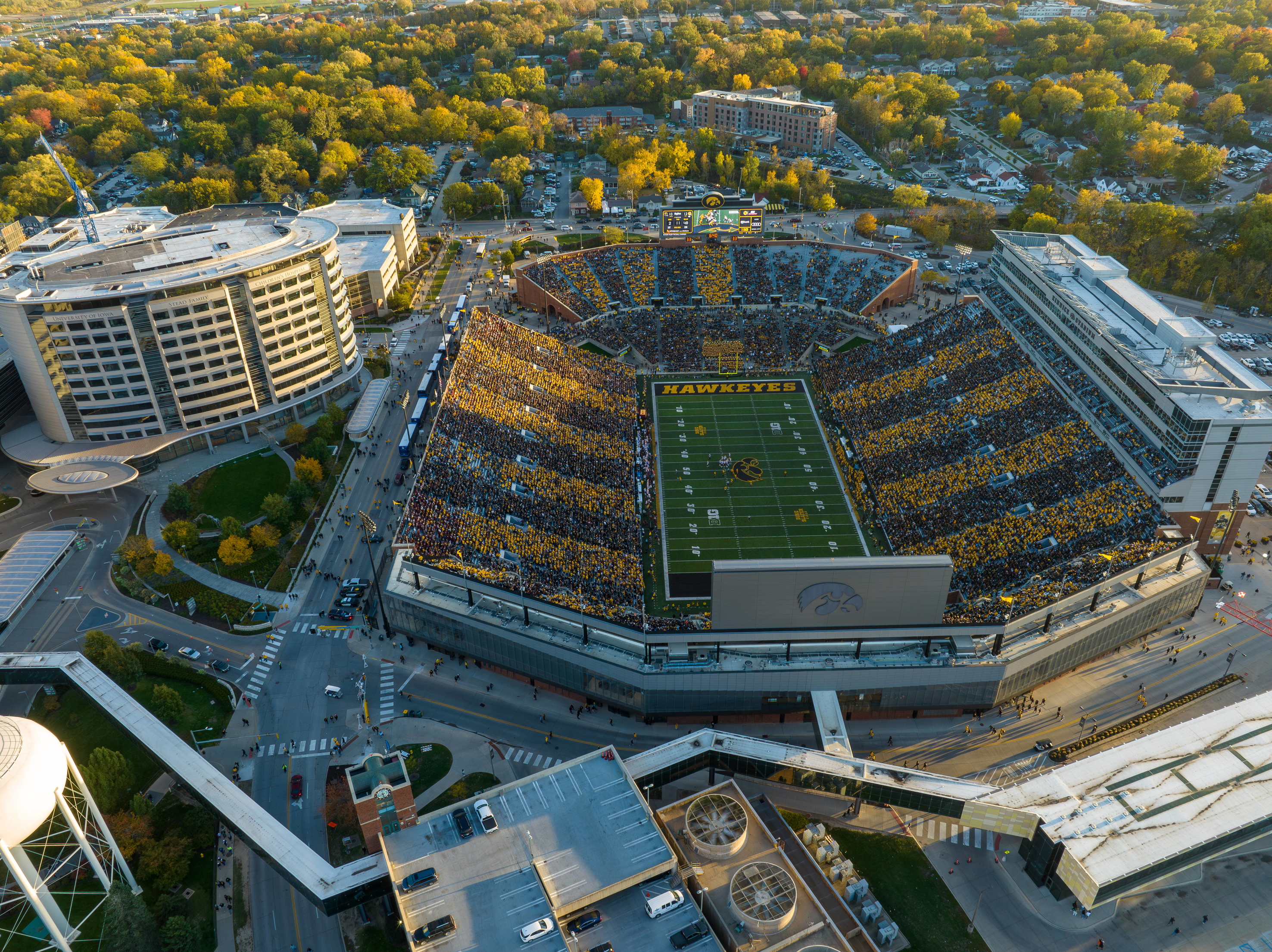 Aerial view of the whole Kinnick Stadium with fans filling the stands on a sunny fall day
